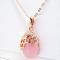 Honey Comb Rose Gold Tone Crystal Embedded Champagne Pink 15 inch Pendant.JPG